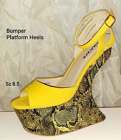 SOLD (buyer California) yellow snake print platform stillettos 8.5